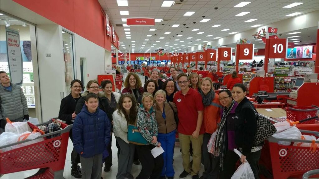 Shopping at Target. Target employee gave them his coupons too.